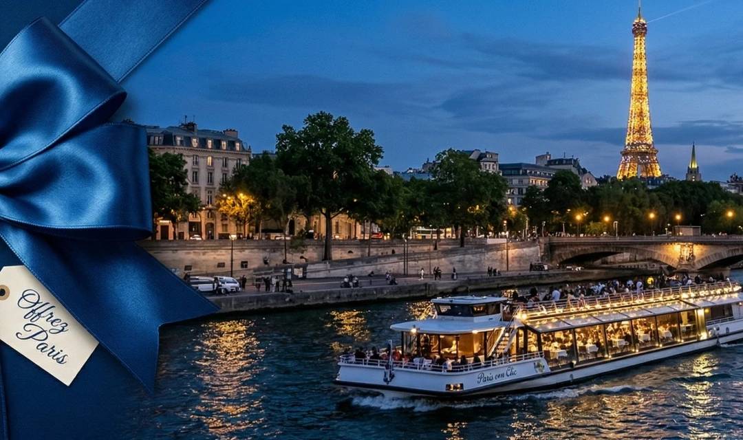 Gift card dinner cruise Paris: illuminated restaurant boat on the Seine in front of the Eiffel Tower with a blue satin gift bow